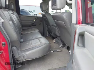 2005 Nissan Titan SE with VIN 1N6BA07B35N500027, listed as a IAAI auction lot 42150226 with 200,877 mi miles. Bid and sale history available at carsss.com. Image 8.