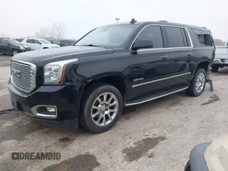 2017 GMC Yukon XL Denali with VIN 1GKS2HKJ2HR310377, listed as a IAAI auction lot 41153582 with 130,194 mi miles. Bid and sale history available at carsss.com. Image 2.