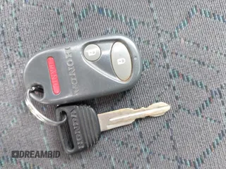 1999 Honda Civic EX z VIN 1HGEJ8241XL068738, wystawiony jako IAAI lot #42568778 z przebiegiem 202 590 mil mil oraz . Historia ofert i sprzedaży dostępna na DreamBid. Obrazek 11.