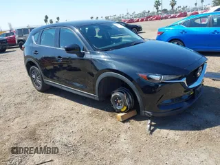 2020 Mazda CX-5 Sport with VIN JM3KFABM2L0761184, listed as a IAAI auction lot 41847768 with 47,582 mi miles. Bid and sale history available at carsss.com. Image 1.