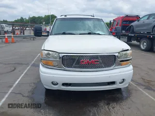 2005 GMC Yukon Denali z VIN 1GKEK63U55J259803, wystawiony jako IAAI lot #42126835 z przebiegiem 199 762 mil mil oraz . Historia ofert i sprzedaży dostępna na DreamBid. Obrazek 12.