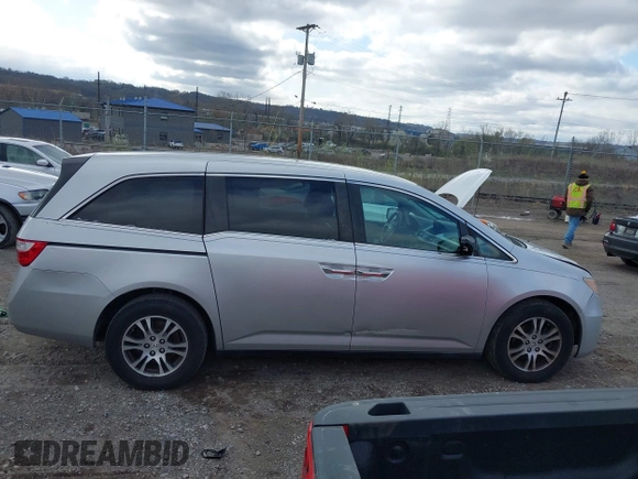 2011 Honda Odyssey EX-L with VIN 5FNRL5H60BB012206, listed as a IAAI auction lot 41982987 with 220,913 mi miles and . Bid and sale history available at carsss.com. Image 13.