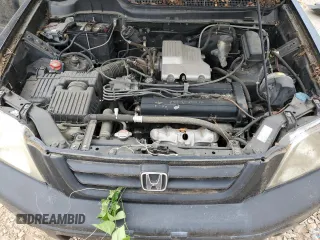 1999 Honda CR-V LX z VIN JHLRD184XXC006554, wystawiony jako Copart lot #55513235 z przebiegiem 229 237 mil mil oraz Czysty tytuł • Clean title. Historia ofert i sprzedaży dostępna na DreamBid. Obrazek 12.