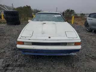 1984 Toyota Supra z VIN JT2MA67L5E0133497, wystawiony jako Copart lot #43439285 z przebiegiem 187 882 mil mil oraz Czysty tytuł • Clean title. Historia ofert i sprzedaży dostępna na DreamBid. Obrazek 5.