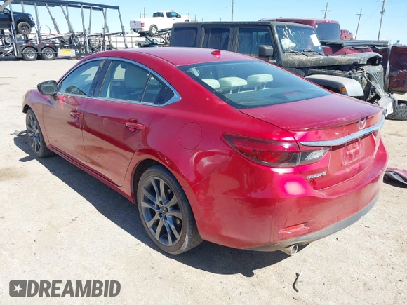 2017 Mazda 6 Grand Touring with VIN JM1GL1W52H1139776, listed as a IAAI auction lot 41671005 with 40,884 mi miles and . Bid and sale history available at DreamBid. Image 3.