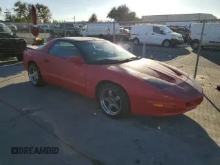 1995 Pontiac Firebird Firebird with VIN 2G2FS22S5S2247034, listed as a Copart auction lot 77779784 with 113,891 mi miles and Clean title. Bid and sale history available at DreamBid. Image 4.