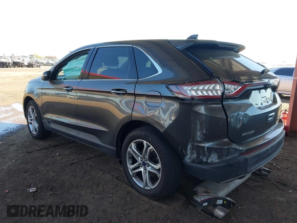 2015 Ford Edge Titanium z VIN 2FMTK3K90FBC12582, wystawiony jako IAAI lot #41860973 z przebiegiem Nie podano mil oraz . Historia ofert i sprzedaży dostępna na DreamBid. Obrazek 3.