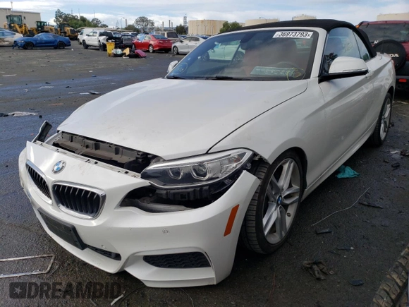 2015 BMW 2 Series 228i with VIN WBA1K5C59FV242748, listed as a Copart auction lot 36973793 with 50,602 mi miles and . Bid and sale history available at carsss.com. Image 1.
