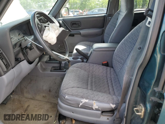 1998 Jeep Cherokee Sport z VIN 1J4FJ68S4WL101110, wystawiony jako Copart lot #57696755 z przebiegiem 218 254 mil mil oraz Szkoda całkowita • Salvage title. Historia ofert i sprzedaży dostępna na DreamBid. Obrazek 7.