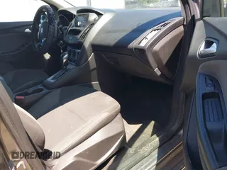 2013 Ford Focus SE z VIN 1FADP3F26DL266821, wystawiony jako IAAI lot #42677519 z przebiegiem 155 238 mil mil oraz . Historia ofert i sprzedaży dostępna na DreamBid. Obrazek 5.