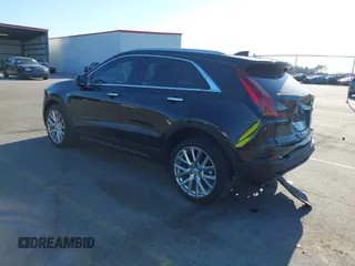 2021 Cadillac XT4 FWD Luxury with VIN 1GYAZAR46MF074767, listed as a IAAI auction lot 41652091 with 46,631 mi miles and . Bid and sale history available at DreamBid. Image 3.