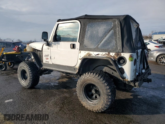 2005 Jeep Wrangler Rubicon with VIN 1J4FA69S05P306428, listed as a Copart auction lot 86441714 with 74,174 mi miles and Salvage Title. Bid and sale history available at carsss.com. Image 2.