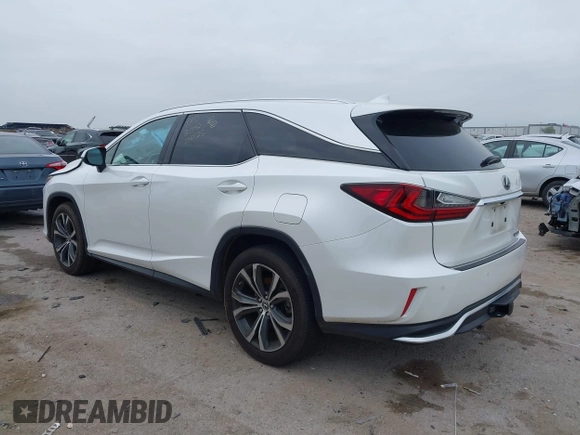 2018 Lexus RX 350L Premium z VIN JTJDZKCAXJ2010125, wystawiony jako IAAI lot #41899420 z przebiegiem 113 995 mil mil oraz . Historia ofert i sprzedaży dostępna na DreamBid. Obrazek 3.