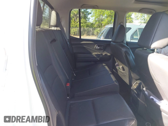 2021 Honda Ridgeline RTL-E with VIN 5FPYK3F7XMB011525, listed as a IAAI auction lot 41774012 with 98,031 mi miles and . Bid and sale history available at DreamBid. Image 8.