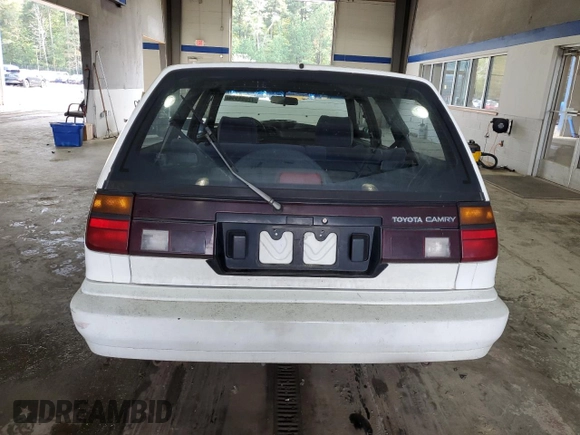 1991 Toyota Camry z VIN JT2SV21W7M0380204, wystawiony jako Copart lot #72694404 z przebiegiem 242 162 mil mil oraz Szkoda całkowita • Salvage title. Historia ofert i sprzedaży dostępna na DreamBid. Obrazek 6.