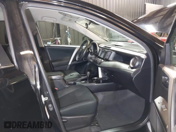 2018 Toyota RAV4 LE with VIN 2T3BFREV7JW768376, listed as a IAAI auction lot 41864571 with 292,147 mi miles. Bid and sale history available at carsss.com. Image 5.