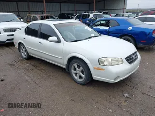 2000 Nissan Maxima GXE z VIN JN1CA31A4YT206065, wystawiony jako IAAI lot #41952514 z przebiegiem 2 953 347 mil mil oraz . Historia ofert i sprzedaży dostępna na DreamBid. Obrazek 1.