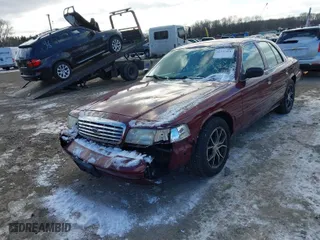 2004 Ford Crown Victoria Standard with VIN 2FAFP73W74X150232, listed as a IAAI auction lot 41277271 with 146,518 mi miles. Bid and sale history available at carsss.com. Image 2.
