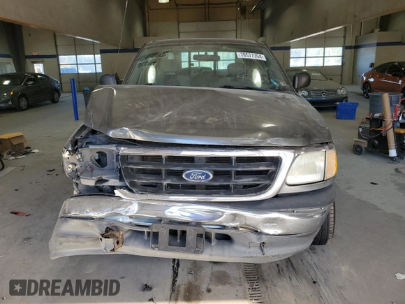 2003 Ford F-150 XL with VIN 1FTRX17263NA82310, listed as a Copart auction lot 76577354 with Not provided miles and Salvage title. Bid and sale history available at DreamBid. Image 5.