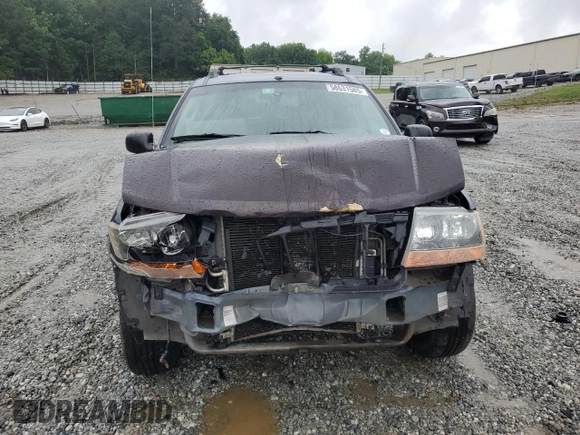 2004 Jeep Grand Cherokee Laredo with VIN 1J4GX48SX4C201569, listed as a Copart auction lot 58631585 with 271,124 mi miles and Salvage title. Bid and sale history available at DreamBid. Image 5.