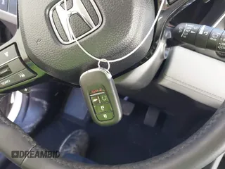2024 Honda Pilot Touring with VIN 5FNYG2H7XRB016877, listed as a IAAI auction lot 41496013 with 18,213 mi miles and . Bid and sale history available at DreamBid. Image 11.
