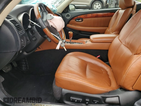 2002 Lexus SC 430 with VIN JTHFN48Y920006524, listed as a Copart auction lot 64680695 with 166,118 mi miles and Salvage title. Bid and sale history available at DreamBid. Image 7.