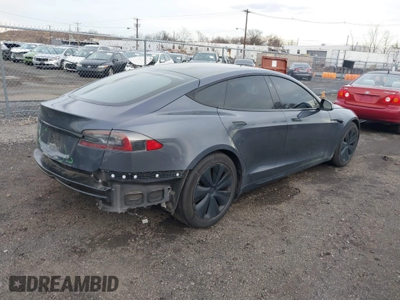2021 Tesla Model S Long Range with VIN 5YJSA1E51MF440929, listed as a IAAI auction lot 41144902 with Not provided miles and . Bid and sale history available at DreamBid. Image 4.