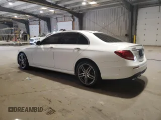 2018 Mercedes-Benz E 300 with VIN WDDZF4JB7JA314257, listed as a Copart auction lot 54071805 with 76,658 mi miles and Salvage title. Bid and sale history available at DreamBid. Image 2.