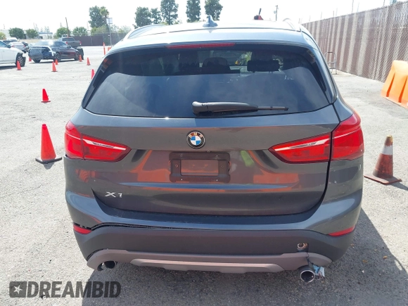 2018 BMW X1 xDrive28i with VIN WBXHT3C30J5L34702, listed as a IAAI auction lot 41935803 with 42,174 mi miles. Bid and sale history available at carsss.com. Image 16.