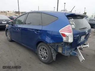 2015 Toyota Prius v Two with VIN JTDZN3EU7FJ029780, listed as a IAAI auction lot 41837874 with 166,977 mi miles. Bid and sale history available at carsss.com. Image 3.