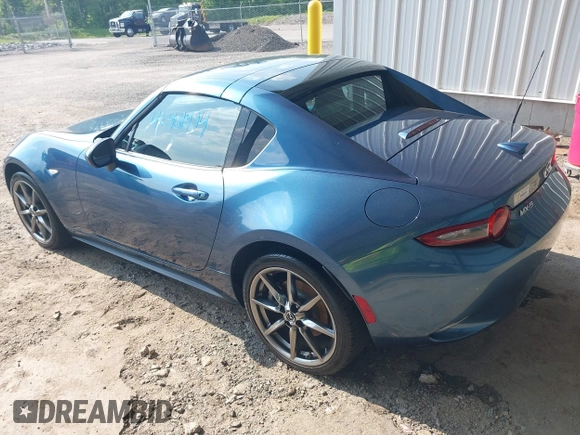 2018 Mazda MX-5 Miata Grand Touring with VIN JM1NDAM71J0201351, listed as a IAAI auction lot 42401474 with 96,054 mi miles and . Bid and sale history available at DreamBid. Image 3.
