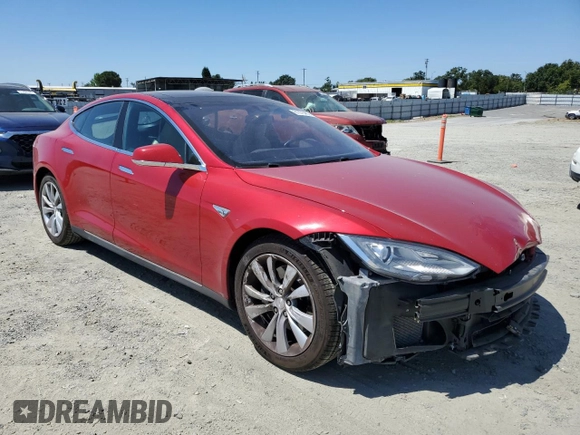 2014 Tesla Model S 60 with VIN 5YJSA1H17EFP64266, listed as a Copart auction lot 61678485 with 104,160 mi miles and Salvage title. Bid and sale history available at DreamBid. Image 4.