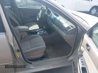 2006 Toyota Camry STD with VIN 4T1BE30K26U155059, listed as a IAAI auction lot 42158259 with 164,353 mi miles and . Bid and sale history available at carsss.com. Image 5.