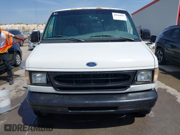 1998 Ford Econoline Cargo with VIN 1FTRE1420WHB15038, listed as a IAAI auction lot 41826051 with 338,809 mi miles. Bid and sale history available at carsss.com. Image 12.