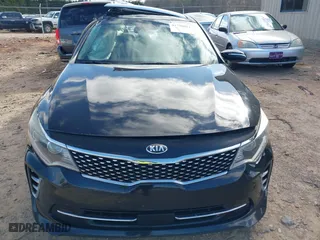 2017 Kia Optima EX with VIN 5XXGU4L33HG135421, listed as a IAAI auction lot 41738011 with 128,594 mi miles. Bid and sale history available at carsss.com. Image 12.
