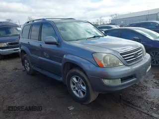 2003 Lexus GX with VIN JTJBT20X830006106, listed as a IAAI auction lot 41520749 with 264,413 mi miles. Bid and sale history available at carsss.com. Image 1.