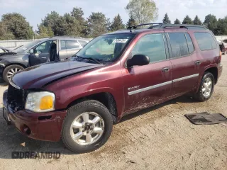 2006 GMC Envoy SLE with VIN 1GKET16S766125647, listed as a Copart auction lot 74894724 with 162,905 mi miles and Salvage Title. Bid and sale history available at DreamBid. Image 1.