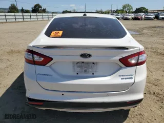 2015 Ford Fusion Titanium Hybrid with VIN 3FA6P0RU3FR184036, listed as a Copart auction lot 51936955 with 370,750 mi miles and Salvage Title. Bid and sale history available at carsss.com. Image 6.