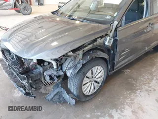 2019 Volkswagen Jetta S with VIN 3VWC57BU3KM070838, listed as a IAAI auction lot 42010372 with 89,999 mi miles and . Bid and sale history available at DreamBid. Image 6.