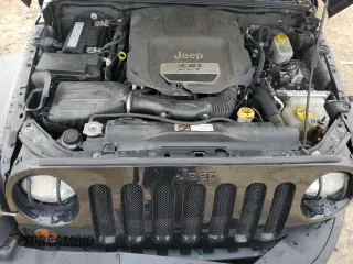 2013 Jeep Wrangler Unlimited Sahara with VIN 1C4BJWEG8DL584909, listed as a Copart auction lot 58520555 with 91,633 mi miles and Salvage title. Bid and sale history available at DreamBid. Image 11.