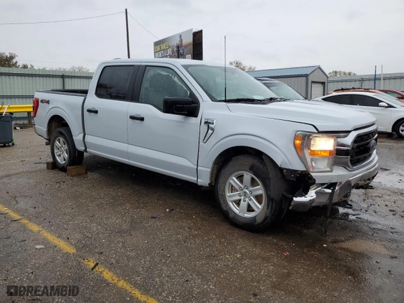 2022 Ford F-150 XL with VIN 1FTEW1EB8NKE34568, listed as a Copart auction lot 79665054 with 61,269 mi miles and Salvage Title. Bid and sale history available at carsss.com. Image 4.