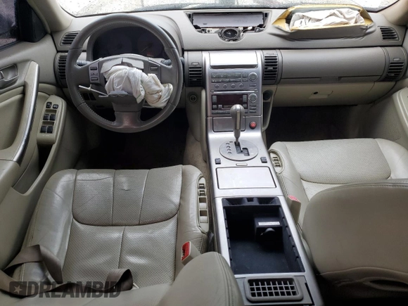 2004 Infiniti G35 w/Leather with VIN JNKCV51E54M613413, listed as a Copart auction lot 71264244 with 206,999 mi miles and Salvage Title. Bid and sale history available at DreamBid. Image 8.