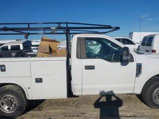 2019 Ford F-350 with VIN 1FDBF3A65KED19570, listed as a IAAI auction lot 41627705 with 158,017 mi miles and . Bid and sale history available at DreamBid. Image 14.