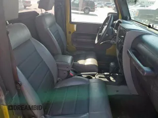 2008 Jeep Wrangler X with VIN 1J4FA24148L617265, listed as a Copart auction lot 53054495 with 143,270 mi miles and Salvage Title. Bid and sale history available at DreamBid. Image 10.