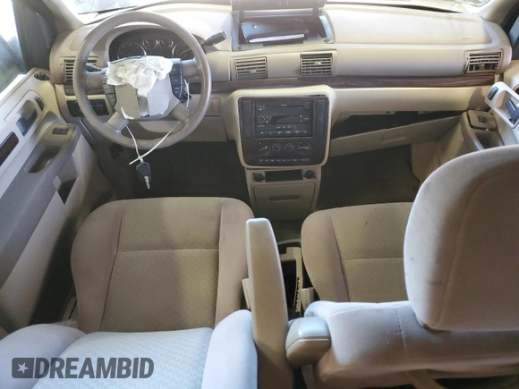 2007 Ford Freestar SEL z VIN 2FMZA52257BA12486, wystawiony jako Copart lot #47176444 z przebiegiem 51 632 mil mil oraz Czysty tytuł • Clean title. Historia ofert i sprzedaży dostępna na DreamBid. Obrazek 8.