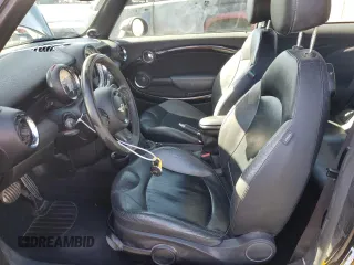 2012 MINI Hardtop S with VIN WMWSV3C59CT387246, listed as a Copart auction lot 61766125 with 155,156 mi miles and Salvage title. Bid and sale history available at DreamBid. Image 7.