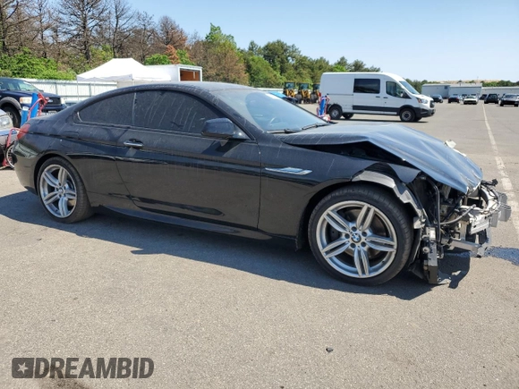 2015 BMW 6 Series z VIN WBALY1C57FDZ73541, wystawiony jako Copart lot #57294034 z przebiegiem 136 357 mil mil oraz Czysty tytuł • Clean title. Historia ofert i sprzedaży dostępna na DreamBid. Obrazek 4.