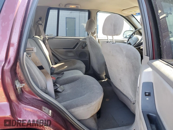 2000 Jeep Grand Cherokee Laredo z VIN 1J4GW48S8YC289367, wystawiony jako Copart lot #51378675 z przebiegiem 176 347 mil mil oraz Szkoda całkowita • Salvage title. Historia ofert i sprzedaży dostępna na DreamBid. Obrazek 11.