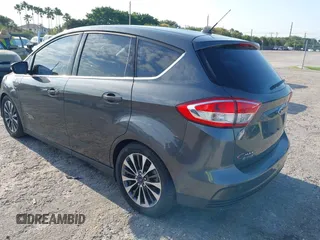 2017 Ford C-Max Energi Titanium with VIN 1FADP5FU9HL117693, listed as a IAAI auction lot 42059763 with 86,827 mi miles. Bid and sale history available at carsss.com. Image 3.