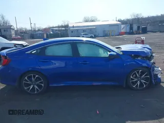 2018 Honda Civic Si z VIN 2HGFC1E52JH709085, wystawiony jako IAAI lot #42069894 z przebiegiem 65 427 mil mil oraz . Historia ofert i sprzedaży dostępna na DreamBid. Obrazek 13.